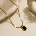 Midnight Muse Gold Pendant Necklace